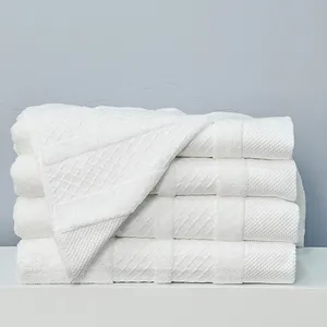 Bset vente de luxe en gros hôtel serviette de bain 100% coton blanc Satin gear spa serviette de bain pour spa logo personnalisé