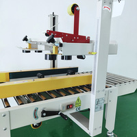 Machine de cachetage de boîte de carton à faible coût pour ligne d'emballage scellant de bande de carton efficace