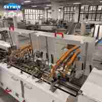 Machine à biscuits sandwichs haute efficacité Skywin avec ensacheuse à flux continu