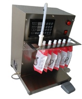 Machine de remplissage et de scellage avec sachets à bec, Mini appareil de remplissage avec emplacement pour le jus de soja