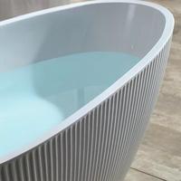 Baignoire autoportante en acrylique de qualité hôtelière, à bords fins, en forme d'œuf, avec design sans joint et motif rayé