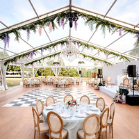 Tente de réception de luxe TENTCHO à structure en aluminium avec toit en PVC transparent et murs en verre pour événements de mariage en plein air