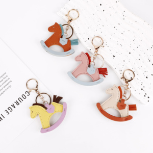 25款新潮新款卡通摇马包吊饰创意PU皮革钥匙扣女包吊饰配件 - Product Image 1