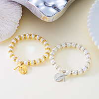 Bijoux de mode européens et américains New Madonna Cross Imitation Pearl Bracelet Fashion Commuting Elegant Joker Beaded Jewelry