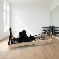 Reformer de Pilates professionnel en bois d'érable avec système de barre de pieds réglable intégré et cadre en bois d'érable plus épais