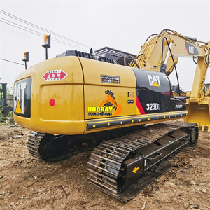 Excavatrice Caterpillar 323DL d'occasion à faible nombre d'heures de fonctionnement, équipée d'un moteur C6.4 ACERT, puissance de 110 kW, poids opérationnel de 23 tonnes, 3 m de profondeur de travail. - Product Image 1