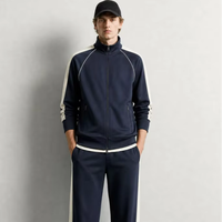 Ensemble de survêtement homme bleu marine 2 pièces avec col montant, fermeture éclair intégrale, blocs de couleur, rayures et poignets côtelés, style jogger OEM ODM