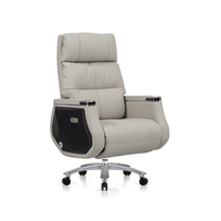 Fauteuil de bureau exécutif moderne de luxe en cuir véritable, inclinable, avec accoudoirs et appui-tête réglables en hauteur, idéal pour les bureaux à domicile et les chambres.