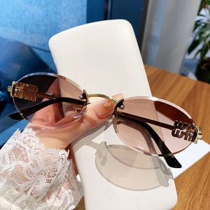 Oval Frameless <b>Sunglasses</b> Black PC Lens UV400 Unisex Fashion Style - Product Image 2