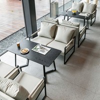 Ensemble de canapé et fauteuil en cuir avec table basse à structure métallique pour café, restaurant, bar, hall d'hôtel, espace détente