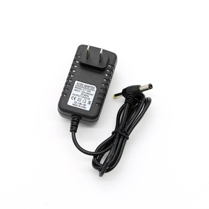 Adaptador de Corriente Alterna/Corriente Directa Rey.1 de 12V 2A para Reproductor de DVD/EVD Portátil con Cabezal Doble Tipo T - Product Image 1