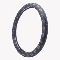 Housse de volant de luxe noire à monogramme, texture fine, cuir PU antidérapant, accessoires intérieurs universels pour voiture