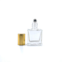 Flacon compte-gouttes plat transparent en verre de 10 ml et 20 ml pour parfum et attar, avec bille métallique et capuchon en aluminium, idéal pour les huiles essentielles et les sérums de soin.