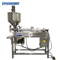 Machine de remplissage liquide semi-automatique d'acier inoxydable d'usine de Guangzhou pour le cosmétique d'huile en plastique de boissons