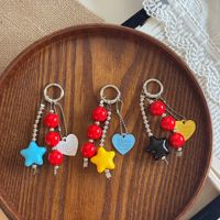 Vente en gros usine : Porte-clés à perles étoile, Breloque de sac à perles rondes rouges, Porte-clés avec pendentif cœur pour sacs à dos, sacs à main, étuis de téléphone pour filles, Cadeau