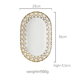 <span class=keywords><strong>Assiette</strong></span> ovale élégante de luxe dorée pour banquet, <span class=keywords><strong>assiette</strong></span> ovale en céramique pour restaurant, <span class=keywords><strong>assiette</strong></span> de présentation pour pâtes et desserts avec bordure en forme de cœur évidé - Product Image 2