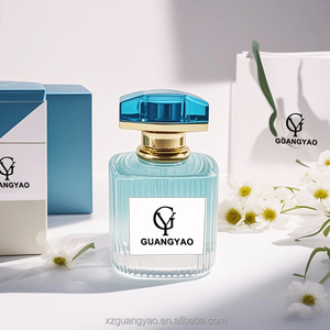 Flacon de parfum rayé bleu clair 50ml 100ml Flacon de parfum vide avec vaporisateur Boîte d'emballage personnalisée Flacon de parfum OEM - Product Image 1