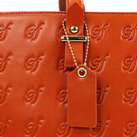 Fabricant de sacs fourre-tout durables pour femmes 2025 Sac de travail polyvalent en cuir à dessus rouge avec logo en relief