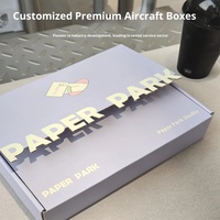 Boîte d'emballage pour vêtements en carton ondulé pliable, couleur personnalisée, pour avion, logistique express, boîte cadeau, logo personnalisé