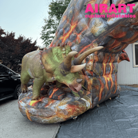 Arche gonflable géante réaliste en forme de dinosaure avec motif volcanique pour les événements de parcs à thème