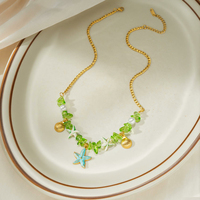 Collier en acier inoxydable plaqué or 18 carats avec perles vert océan et breloque étoile de mer, résistant au ternissement, bijoux bohèmes côtiers