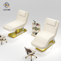Tables et lits de massage électriques en bois personnalisés pour le salon de beauté du visage Dossier du lit de massage en cuir réglable inclinable