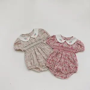 Wholesale Baby Jumpsuit Summer Short Sleeved Manual Smocking Woven Floral Baby Clothes Romper
