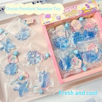 Pendentif Ocean Squeeze en plastique, jouet anti-stress, lot de 24, boîte de couleur
