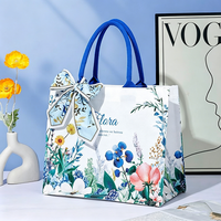 Sac fourre-tout à imprimé floral avec nœud en écharpe, grande capacité, imperméable, laminé, sac de shopping, logo personnalisé pour cadeau et trajets quotidiens