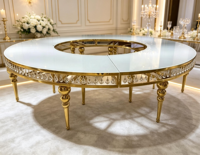 Table de banquet ronde de luxe en cristal avec base en grille dorée pour la location d'événements hôteliers