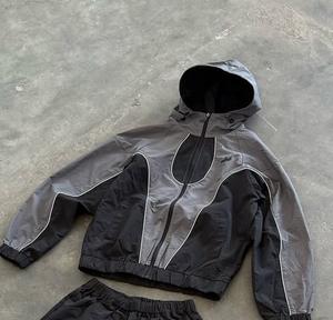 Herensportpak met patchwork windbreaker, ritsjack en shorts - Product Image 1