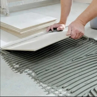 Épandeur d'adhésif pour sols et carrelages Truelle crantée en forme de U