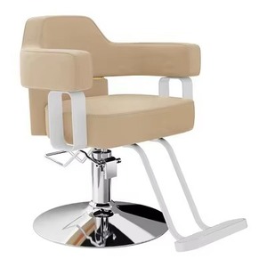 Un fauteuil de barbier ergonomique pivotant avec structure en métal et assise en cuir, réglable en hauteur, design moderne. - Product Image 1