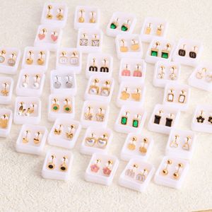 Pendientes de Aro Minimalistas con Incrustaciones de Acero Inoxidable con Baño de Oro PVD de 18K para Mujer, Varios Estilos, Diseño de Moda - Product Image 1