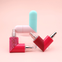 Nouveau style de luxe personnalisé vide rechargeable rouge rose bleu rond en forme de vaporisateur de parfum à double extrémité avec diamant