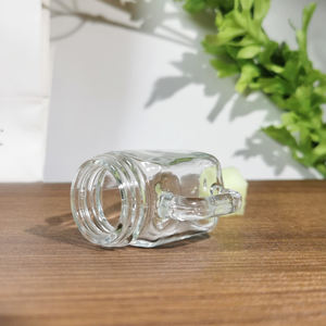 Offre Spéciale personnalisé mini bocal Mason en verre 50ml <span class=keywords><strong>petit</strong></span> bocal <span class=keywords><strong>à</strong></span> <span class=keywords><strong>confiture</strong></span> avec poignée en gros pour le stockage du chocolat bouchon <span class=keywords><strong>à</strong></span> vis étanchéité - Product Image 2