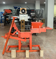 Machine manuelle de fabrication de briques, très prisée au Sénégal, pour la production de briques en argile, optimisant les coûts énergétiques