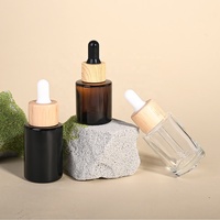 Botol Kaca Pipih 20ml 30ml Custom dengan Cincin Bambu dan Pipet Tetes untuk Kemasan Kosmetik, Minyak Rambut, dan Esens - Promo Hot Sale