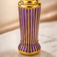 Flacon de parfum vintage cylindrique de 12 ml en verre, design côtelé doré, avec applicateur à bille pour vaporisation, flacon rechargeable avec bouchon à vis