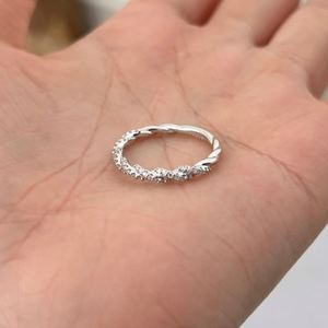 Dylam Exclusive Design High Jewel Rhodium Plated <b>925</b> Sterling <b>Silver</b> 0.245ct D VVS1 Moissanite Twisted Interlock Band <b>Rings</b> - Product Image 6