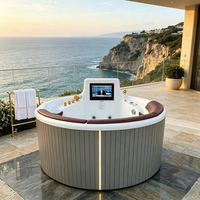 Bain à remous extérieur haut de gamme avec téléviseur intelligent, baignoire de massage ronde autoportante de 1,7 m pour villa de luxe et jardin