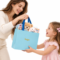 Sac cadeau en papier avec pelliculage brillant et poignées en ruban pour les cadeaux de fête de naissance, les fêtes d'anniversaire et les cadeaux pour nouveau-nés