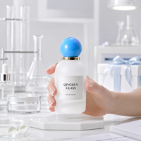 Flacon de parfum en verre givré de 30 ml, 50 ml, 100 ml avec bouchon à bille bleu et pompe pulvérisatrice pour l'emballage de parfums