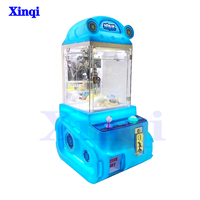 Ventes directes d'usine Machine de jeu à pièces de haute qualité Petite poupée Grab Clip Machine Tank Doll Game Mini Claw Machine