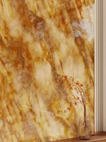 Grande dalle translucide Morning Glow Diffusion avec veines orange-dorées, en céramique frittée, personnalisée pour mur d'entrée de salon et plateau de table