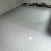 Peinture époxy auto-nivelante effet marbre brillant PURCOAT avec application au truelle pour sols en béton