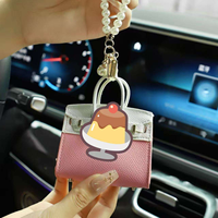 Nouveauté 2026 : Mini porte-sacs de luxe, ornements, porte-monnaie mignon, porte-clés, étui pour écouteurs pour femmes, porte-clés zéro