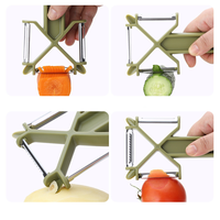 3-in-1 Multifunctionele handmatige plastic roestvrijstalen aardappel- en groenteschiller met slimme raspen, draagbaar voor de keuken