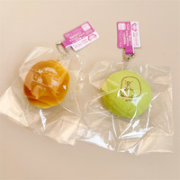 DHF896 Vente en gros de jouets anti-stress en forme de pain, en PU ultra-doux, mignons et moelleux, pendentifs en forme de chignon