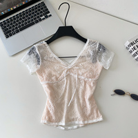 Chemisier d'été élégant pour femme à manches courtes, col en V, en dentelle, avec nœud sur le devant, coupe ample, idéal pour le bureau